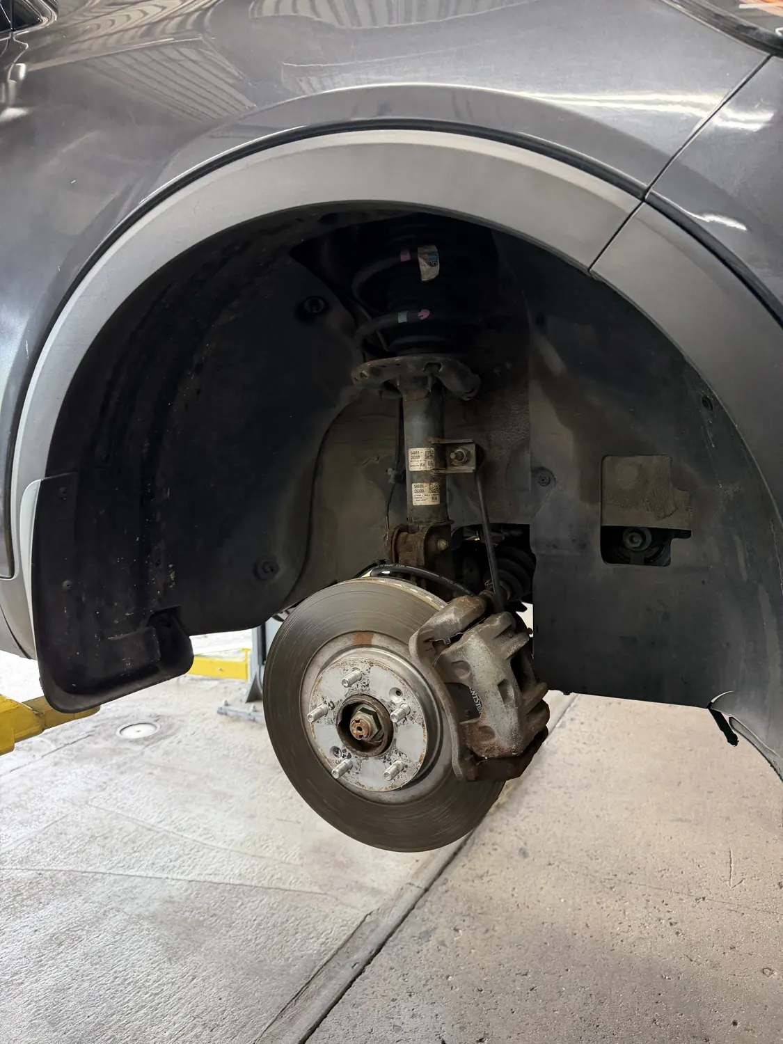Brake inspection at KRP Automotive Repair in Clifton, NJ