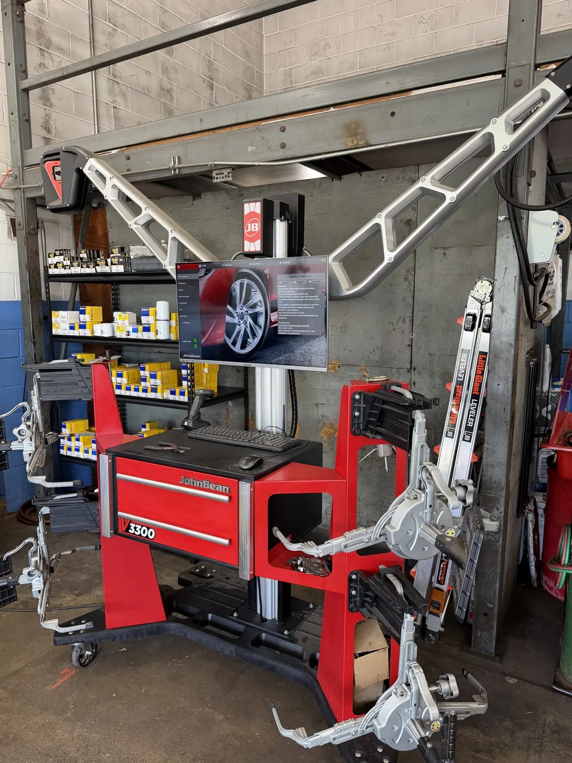 Wheel alignment equipment in use at KRP Automotive Repair in Clifton, NJ