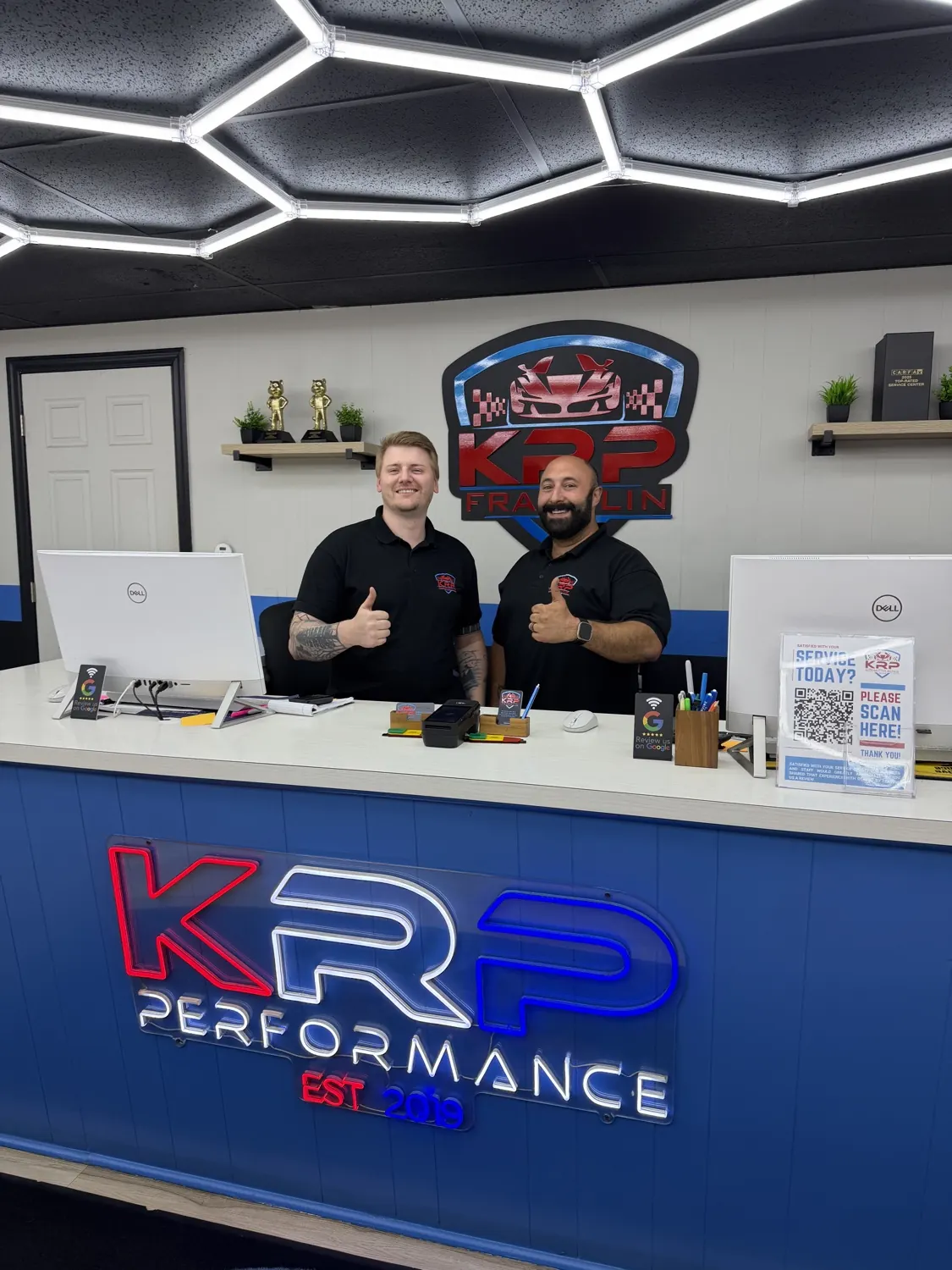 KRP Automotive team members at the Franklin front desk