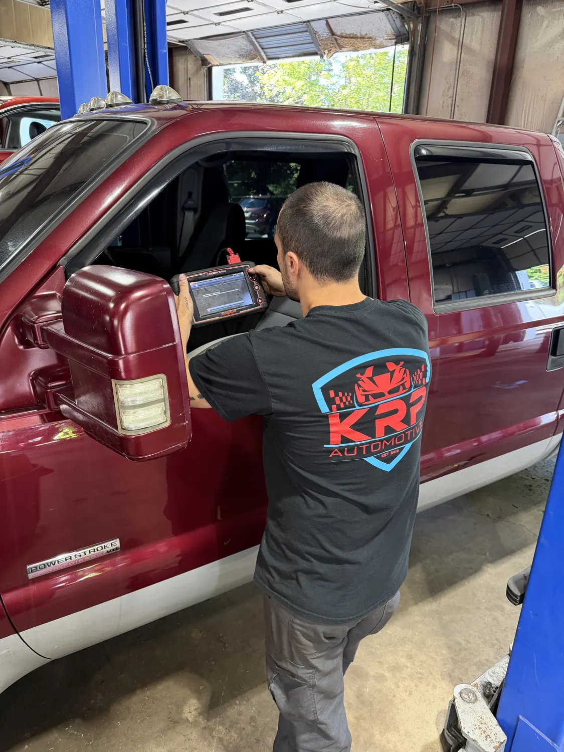 Computerized diagnostics with a scan tool at KRP Automotive Repair in Franklin, NJ