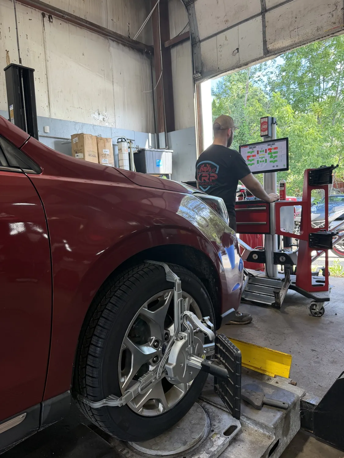 Wheel alignment in progress at KRP Automotive Repair in Franklin, NJ