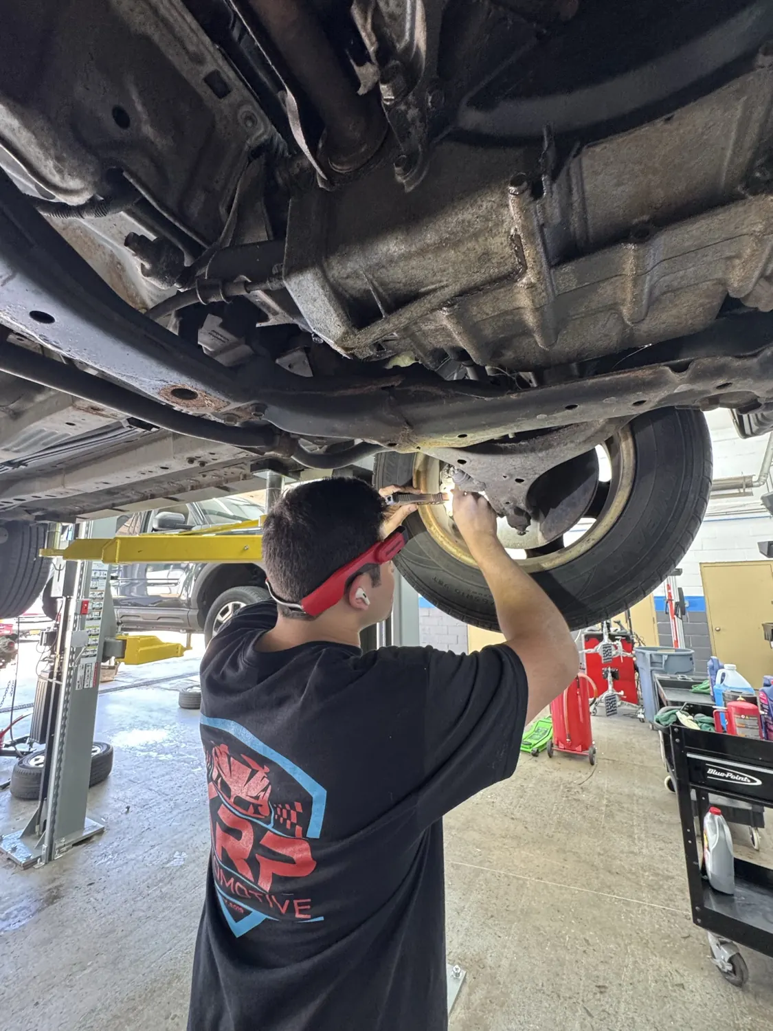 A technician at KRP Automotive Repair in Hawthorne, NJ, the nearest KRP shop to Franklin Lakes