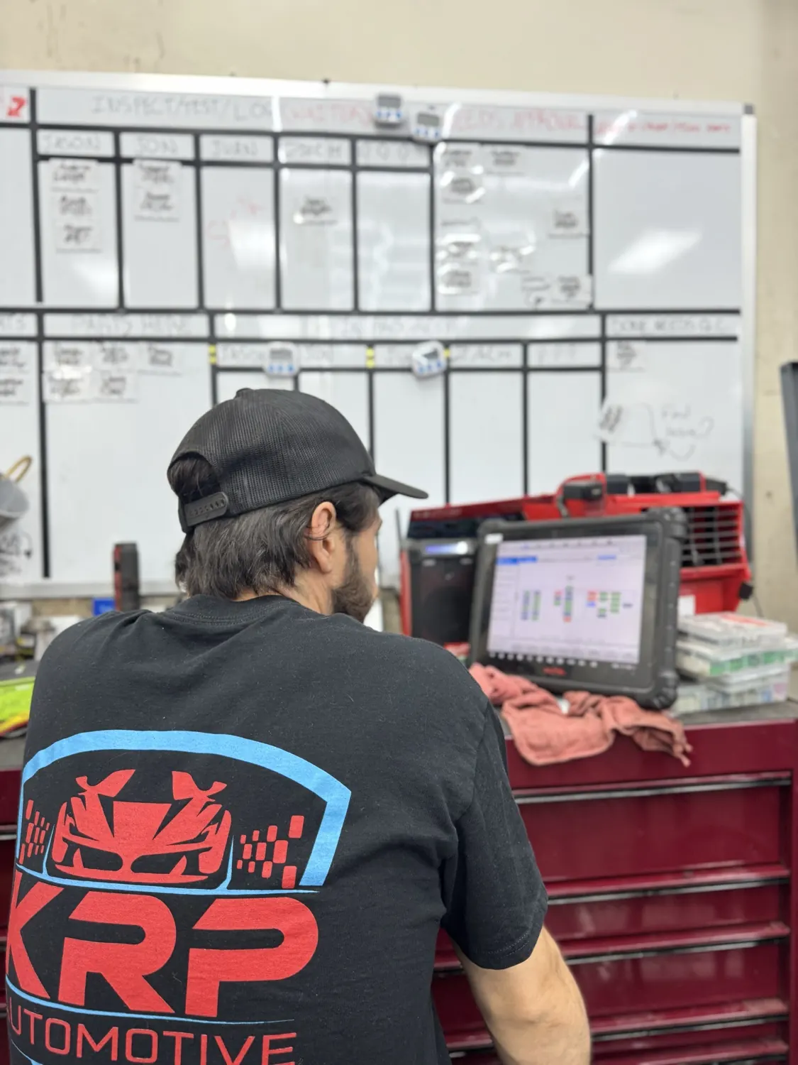 A KRP Automotive technician running diagnostics in Newton, NJ